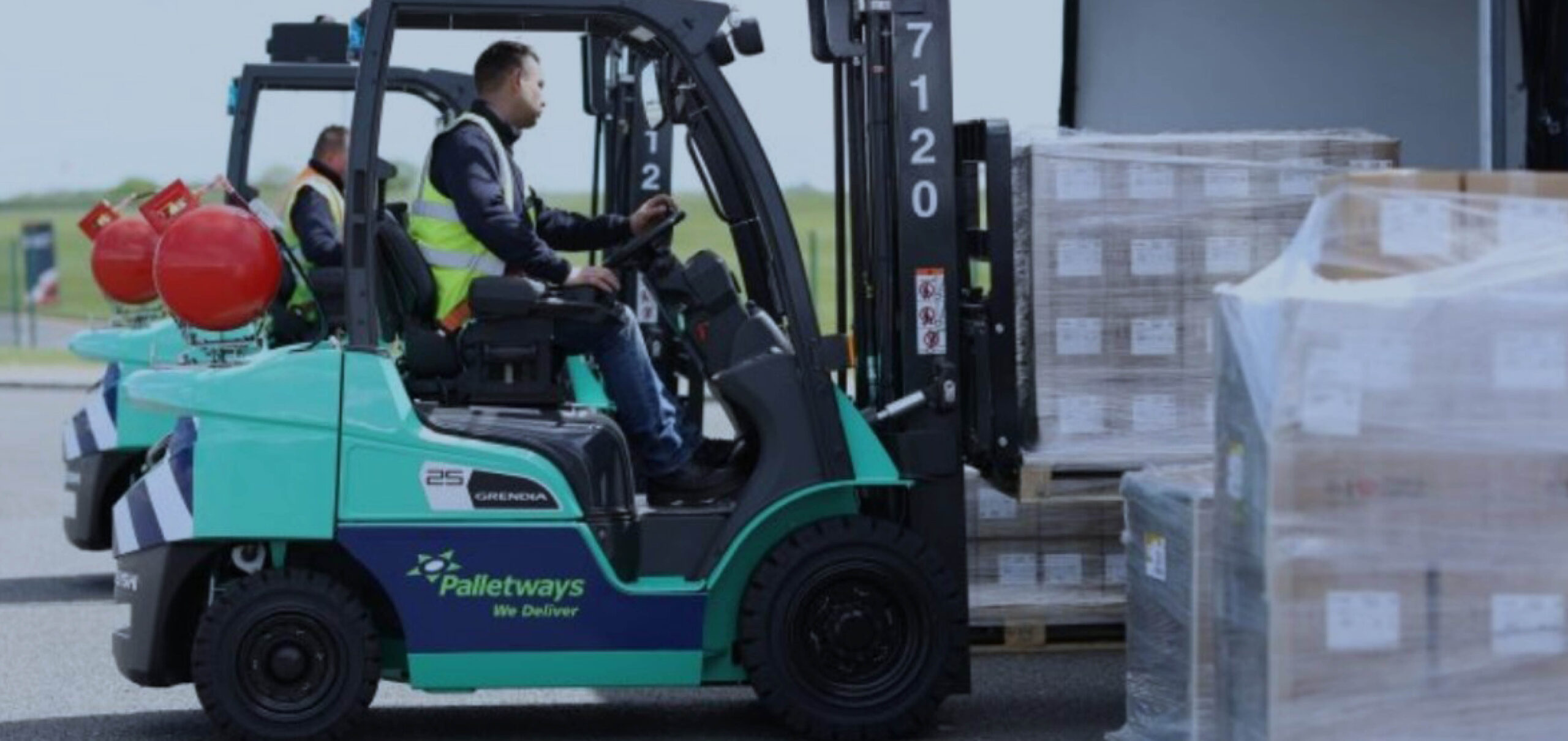 pallet network forklift operator moving pallets